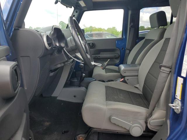 2010 Jeep Wrangler Unlimited Sahara VIN: 1J4BA5H11AL122425 Lot: 54323234