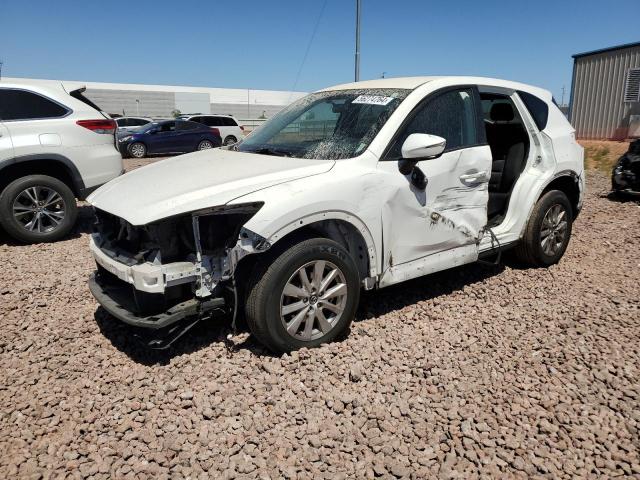 2015 Mazda Cx-5 Touring VIN: JM3KE2CY3F0490635 Lot: 56274764