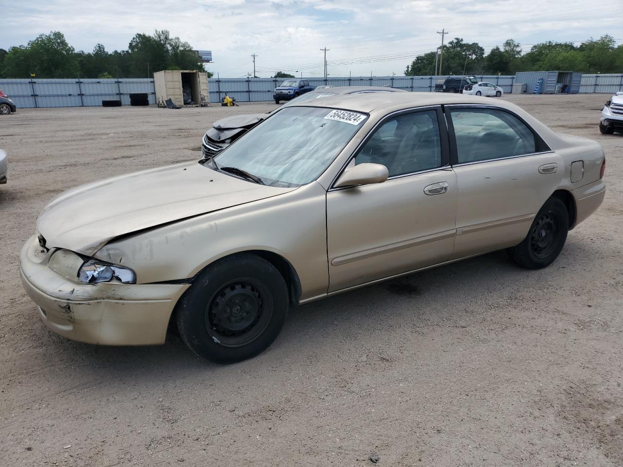 1YVGF22CXW5777386 1998 Mazda 626 Dx