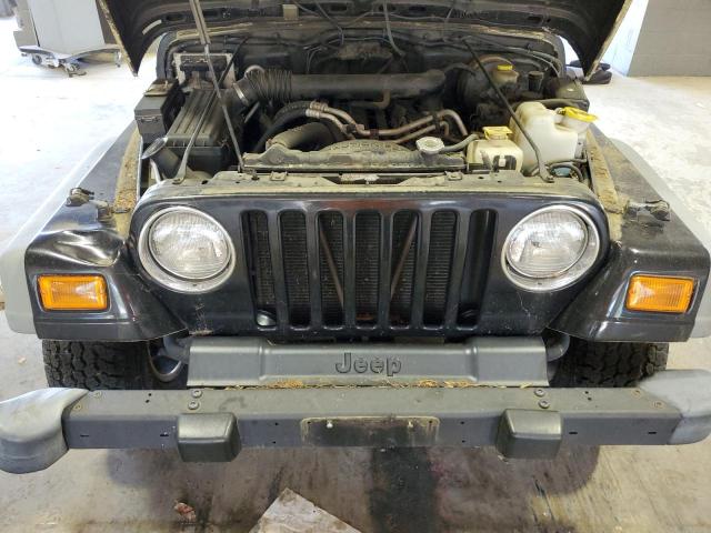 2000 Jeep Wrangler / Tj Sport VIN: 1J4FA49S7YP700582 Lot: 50758284