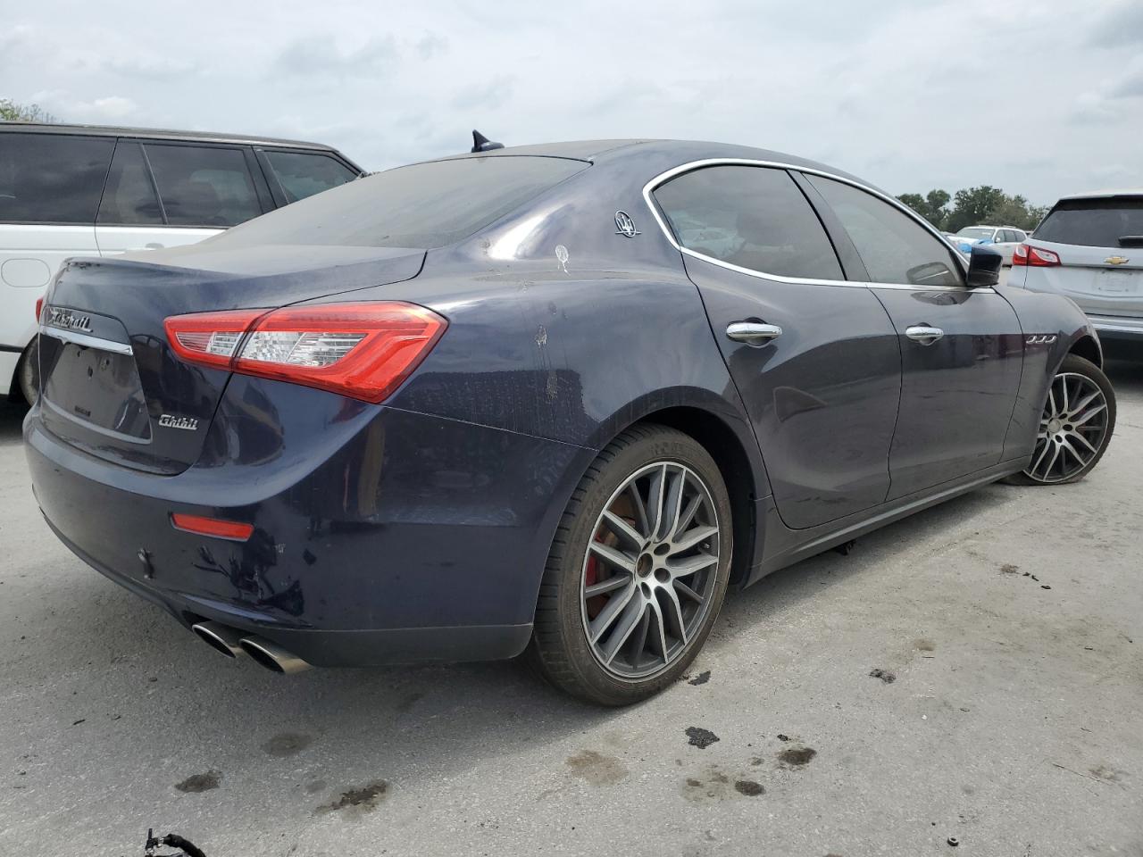 2016 Maserati Ghibli vin: ZAM57XSA5G1175036