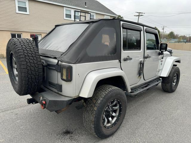 2010 Jeep Wrangler Unlimited Sahara VIN: 1J4HA5H13AL102980 Lot: 53465004