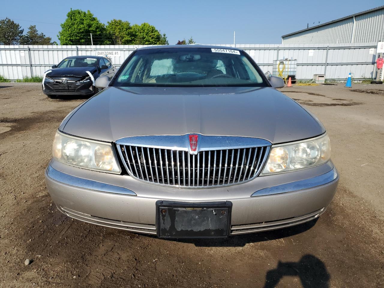 1LNHM97VXXY676606 1999 Lincoln Continental