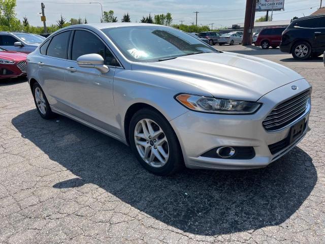 Lot #2521662557 2014 FORD FUSION SE salvage car
