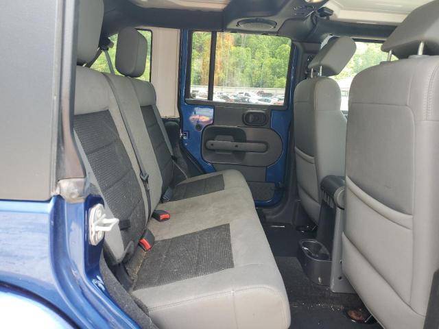 2010 Jeep Wrangler Unlimited Sahara VIN: 1J4BA5H11AL122425 Lot: 54323234