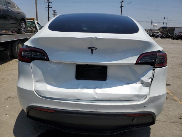 2023 Tesla Model Y VIN: 7SAYGDEE1PA121660 Lot: 57090684