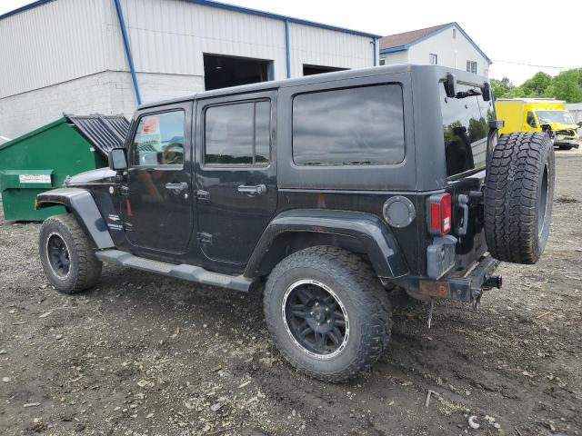 2011 Jeep Wrangler Unlimited Sahara VIN: 1J4HA5H1XBL569668 Lot: 54135704