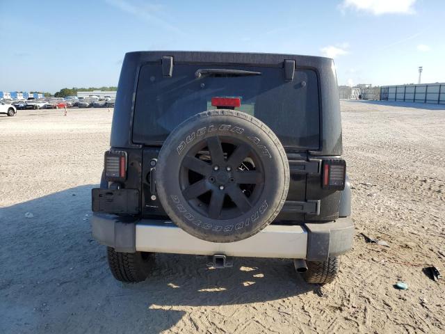 2008 Jeep Wrangler Unlimited Sahara VIN: 1J8GA59118L647594 Lot: 53384894