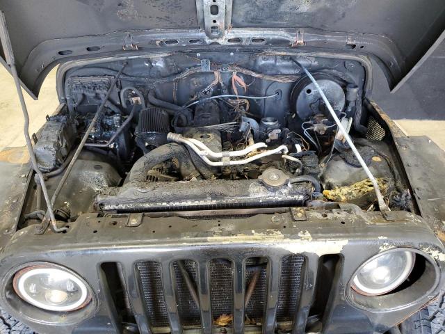 2004 Jeep Wrangler / Tj Sahara VIN: 1J4FA59S74P711954 Lot: 55703214