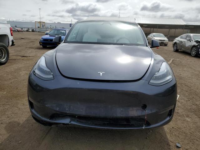 2023 Tesla Model Y VIN: 7SAYGDEE9PF912389 Lot: 53449964