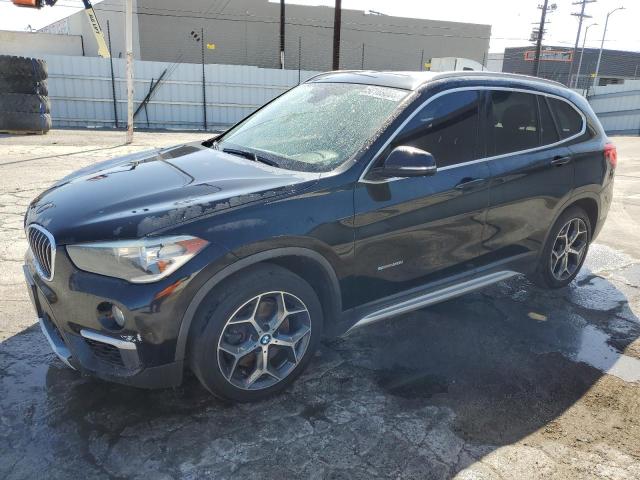 Vin: wbxhu7c34hp924632, lot: 56169005, bmw x1 sdrive28i 2017 img_1