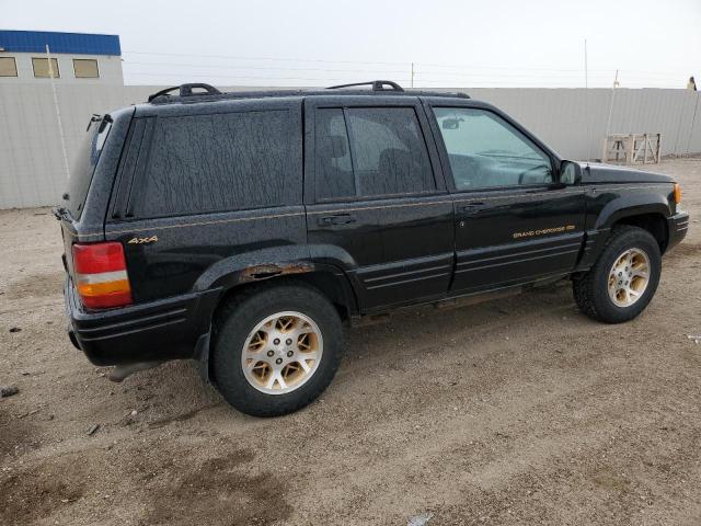 JEEP GRAND CHER 1997 black 4dr spor gas 1J4GZ78Y8VC586034 photo #4