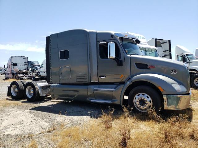 PETERBILT 579 2015 green tractor diesel 1XPBD49X0FD277672 photo #1
