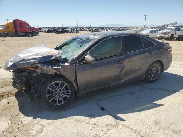 TOYOTA CAMRY LE 2016 charcoal sedan 4d gas 4T1BF1FK0GU209985 photo #1