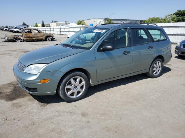 FORD FOCUS 2004 green  gas 1FAFP36N15W180240 photo #1