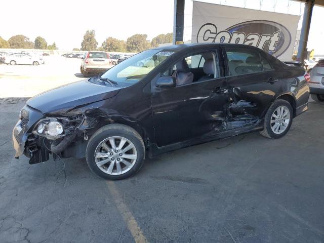 TOYOTA COROLLA BA 2010 black  gas 1NXBU4EE8AZ212630 photo #1