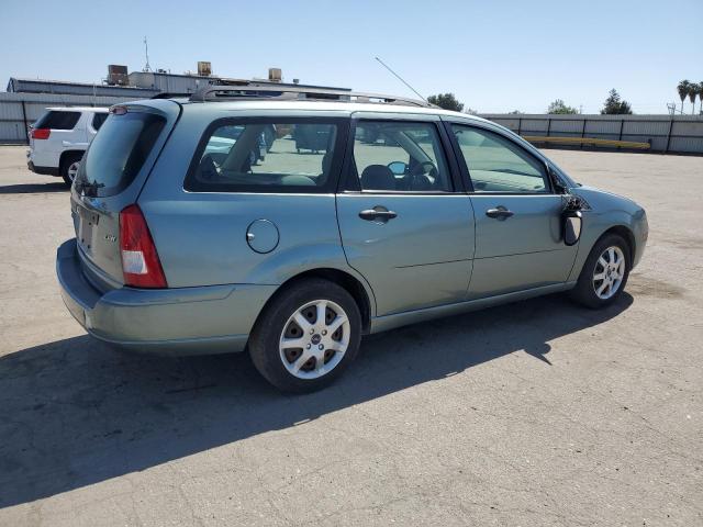 FORD FOCUS 2004 green  gas 1FAFP36N15W180240 photo #4