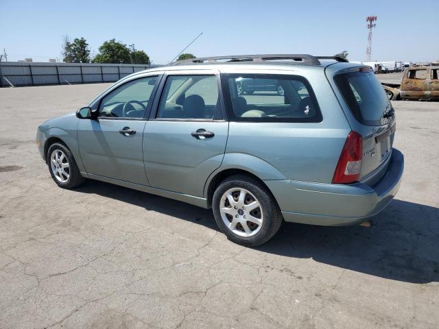 FORD FOCUS 2004 green  gas 1FAFP36N15W180240 photo #3