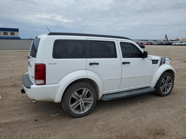 Vin: 1d4pu7gx8bw525499, lot: 58211105, dodge nitro shock 20113