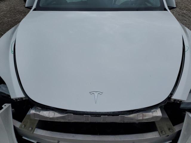 2023 TESLA MODEL Y 7SAYGAEE9PF584339