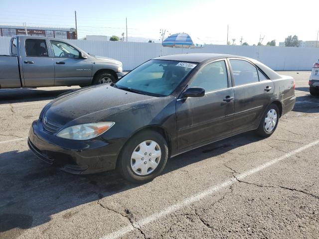 TOYOTA CAMRY LE 2002 black sedan 4d gas JTDBE32K320123532 photo #1