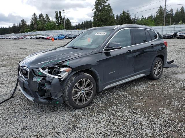 BMW X1 XDRIVE2 2017 black 4dr spor gas WBXHT3C39H5F86168 photo #1