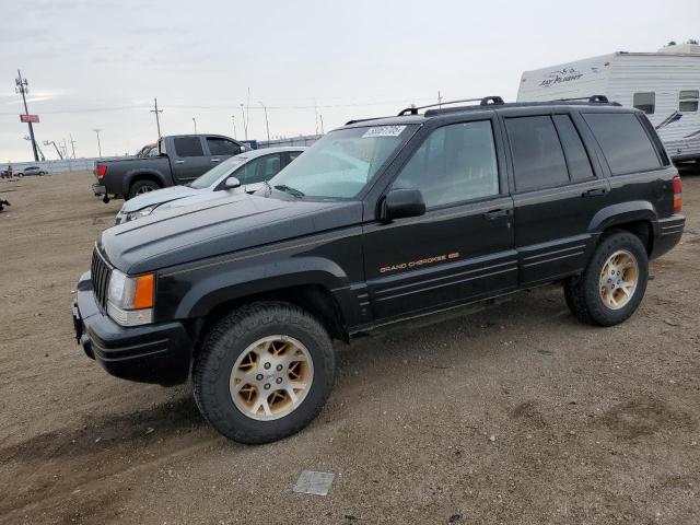JEEP GRAND CHER 1997 black 4dr spor gas 1J4GZ78Y8VC586034 photo #1
