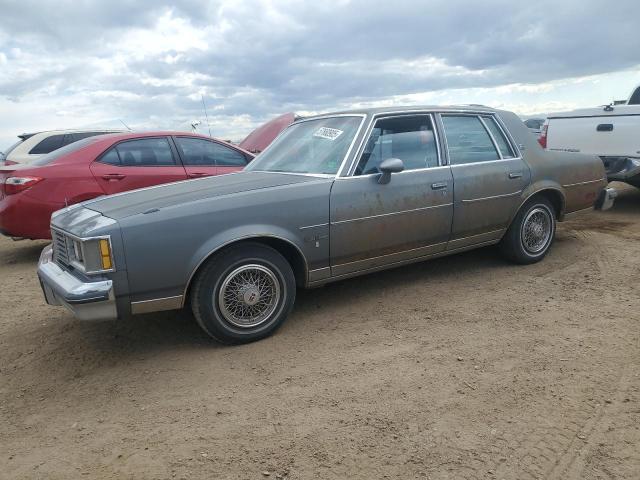 OLDSMOBILE CUTLASS SU 1986 gray  gas 1G3GM69A3GR349726 photo #1