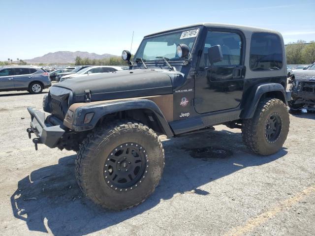 JEEP WRANGLER / 1999 black 2dr spor gas 1J4FY49S8XP472733 photo #1