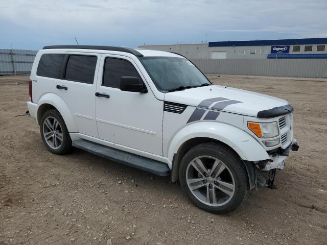 Vin: 1d4pu7gx8bw525499, lot: 58211105, dodge nitro shock 20114