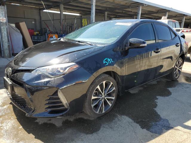 VIN 5YFBURHE5HP696065 2017 TOYOTA COROLLA no.1