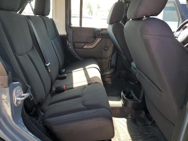 1C4BJWDG1EL148938 Jeep Wrangler Unlimited Sport