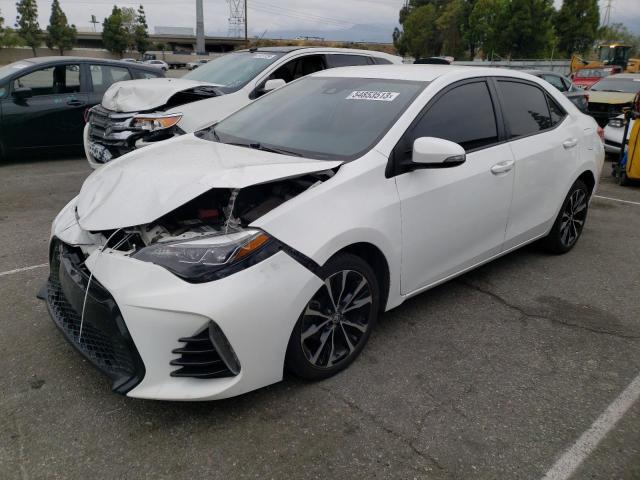 Toyota COROLLA L 2018 5YFBURHE8JP780550 Image 1