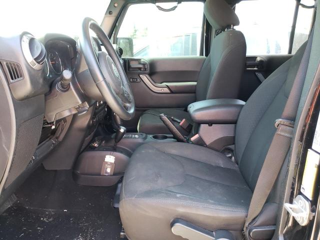 1C4HJWDG9JL818935 Jeep Wrangler Unlimited Sport