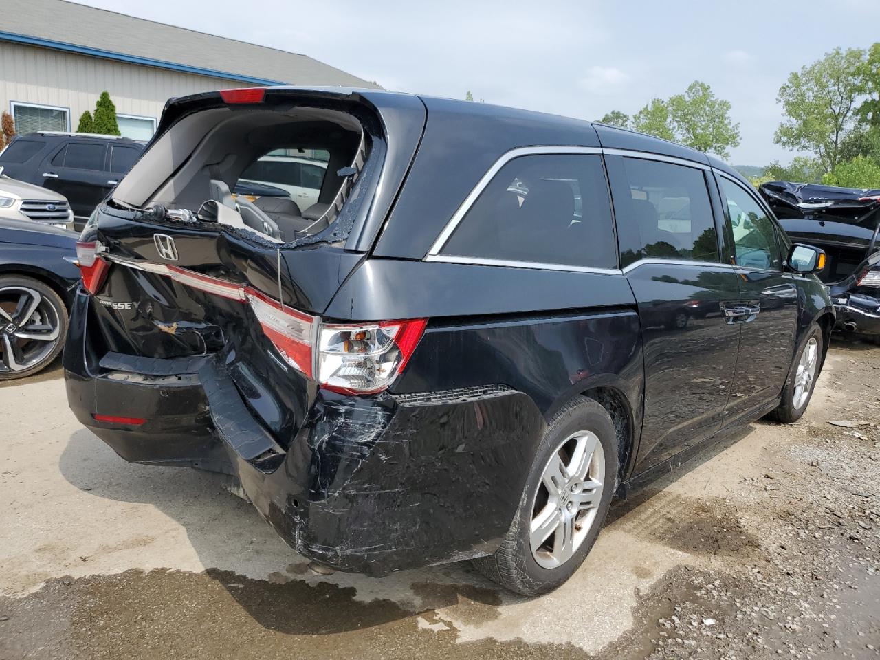 2012 Honda Odyssey Touring vin: 5FNRL5H9XCB097633