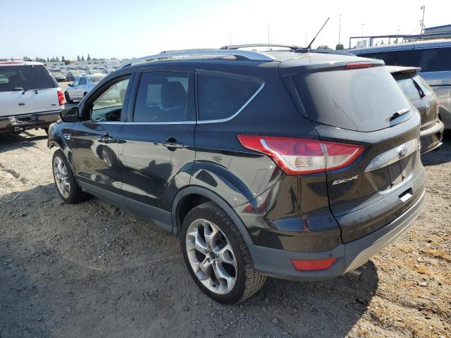 1FMCU0J92EUB92595 Ford Escape Titanium