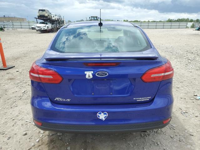 2015 Ford Focus Titanium VIN: 1FADP3J22FL382897 Lot: 57910624