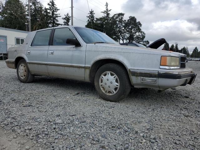 1989 Dodge Dynasty VIN: 1B3BC4635KD561476 Lot: 60512604