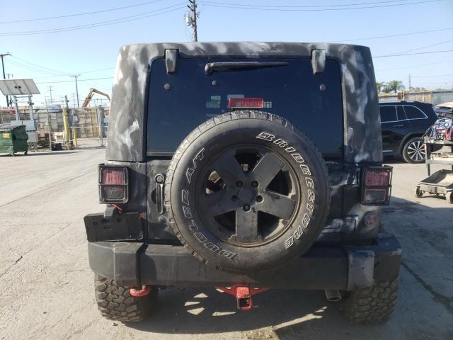 2009 Jeep Wrangler Unlimited Sahara VIN: 1J8GB59149L766027 Lot: 60736444