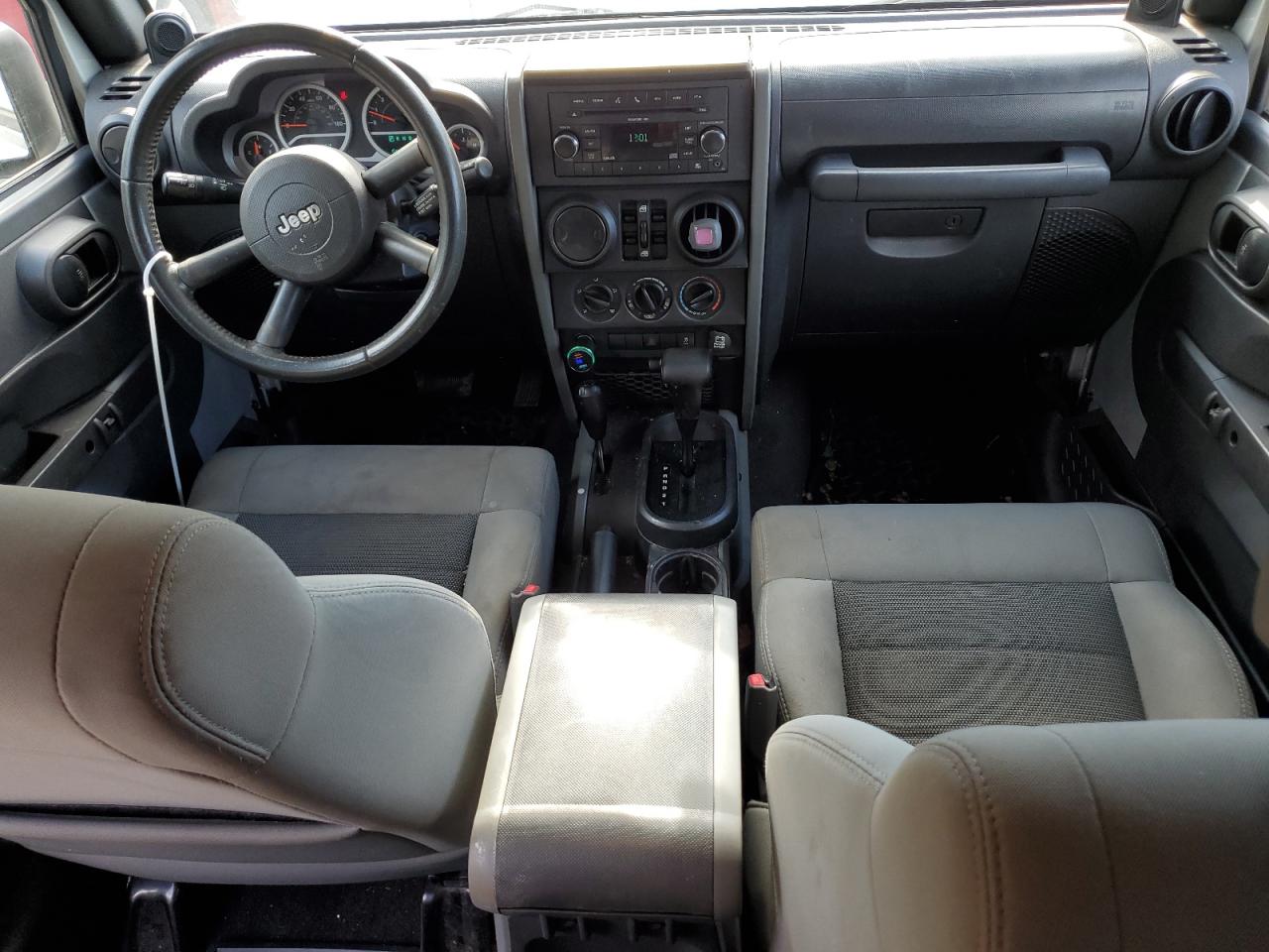 1J4BA3H1XAL112495 2010 Jeep Wrangler Unlimited Sport