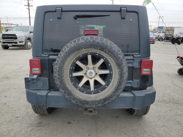 2007 Jeep Wrangler Sahara VIN: 1J4GA591X7L194639 Lot: 59157574