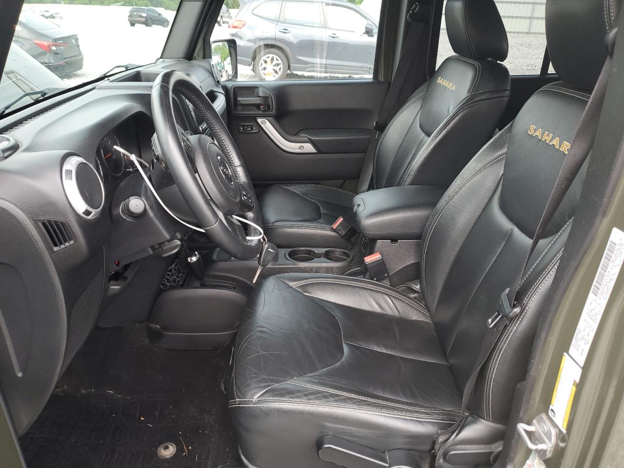 1C4HJWEG9FL753056 2015 Jeep Wrangler Unlimited Sahara