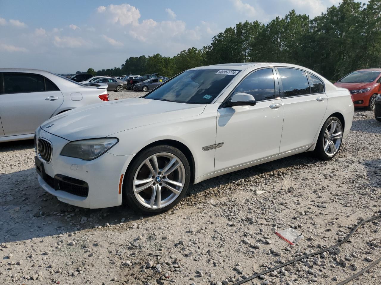 2014 BMW 740 I vin: WBAYA6C59ED144038