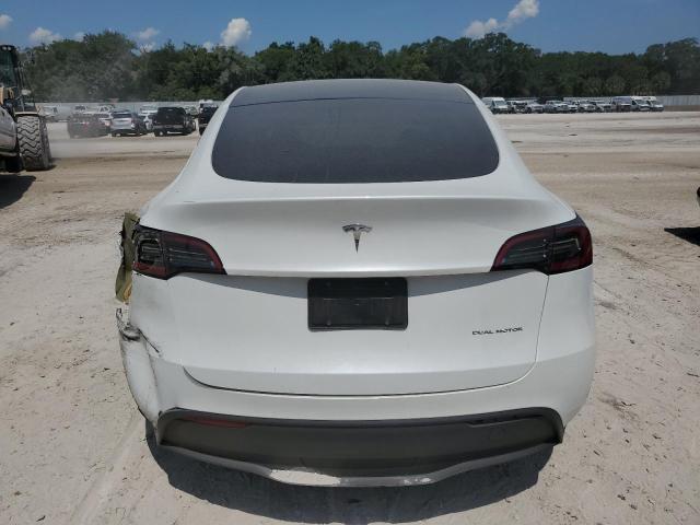 2023 Tesla Model Y VIN: 7SAYGDEF4PA048714 Lot: 57811444