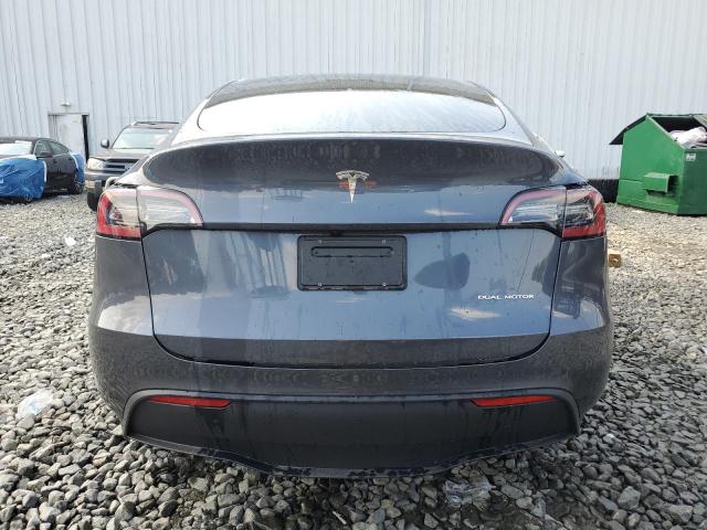 2023 Tesla Model Y VIN: 7SAYGDEE2PA208662 Lot: 58561174