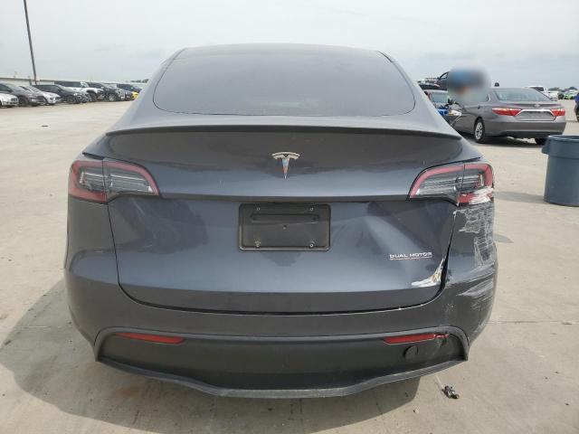 2023 Tesla Model Y VIN: 7SAYGDEFXPF668518 Lot: 57557474