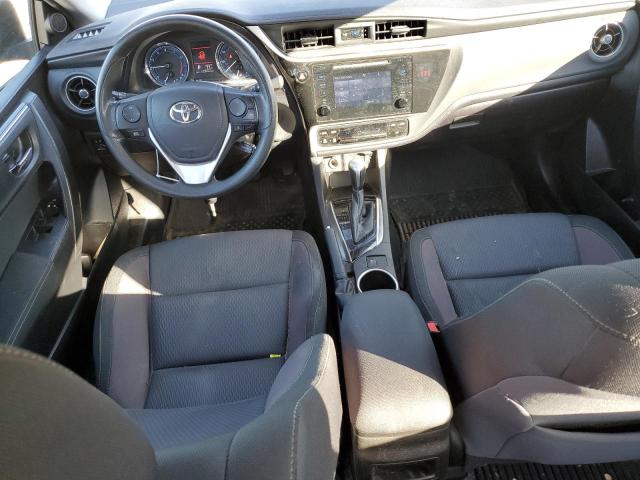 VIN 5YFBURHE5JP766895 2018 Toyota Corolla, L no.8