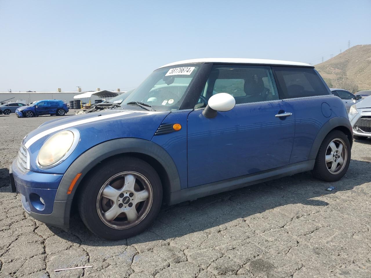 WMWMF33549TW70989 2009 Mini Cooper