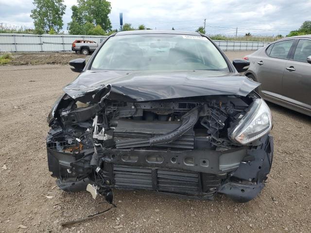 VIN 1FADP3F23HL341304 2017 Ford Focus, SE no.5