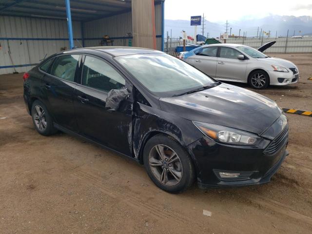 2018 Ford Focus Se VIN: 1FADP3FE9JL260100 Lot: 59328554